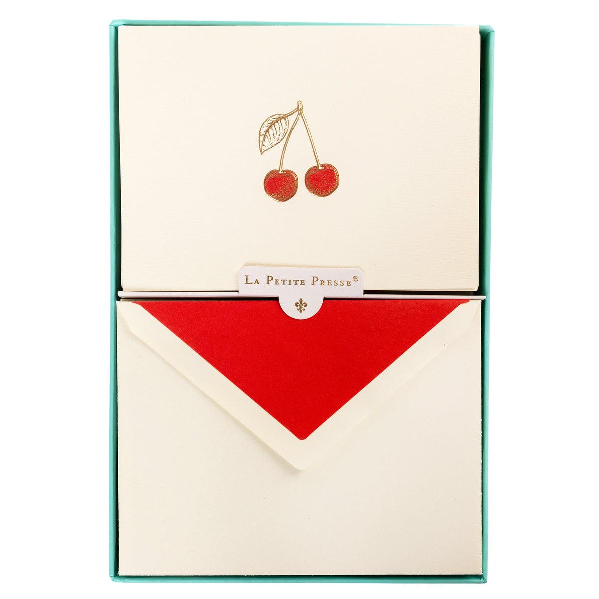 La Petite Presse Cherries Boxed Correspondence Notes, An ivory notecard with gold foil cherries filled in red glitter, paired with a cream envelope lined in bright red.