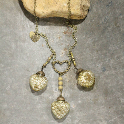 Collar retro de oro viejo "Tres veces el amor"