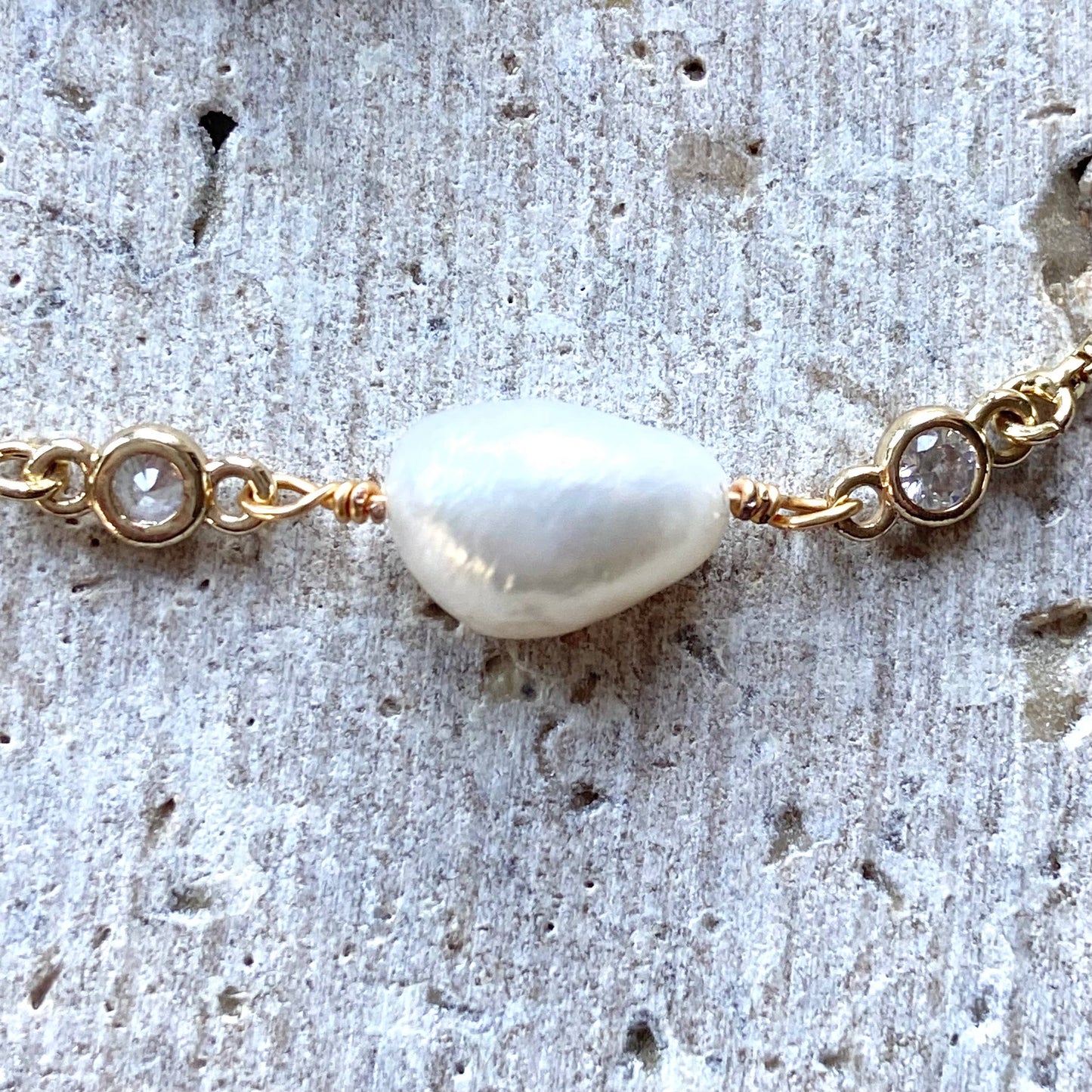 White pearl with gold slider bracelet