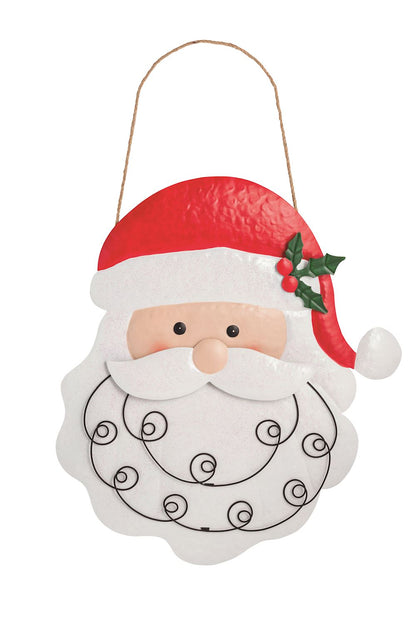 Tin Santa Christmas Card Holder Wall Hanging, 20 Inch, A large tin Santa face with a red hat and holly sprig, a white beard crossed by black wire coils for holding cards, hanging from a jute rope.