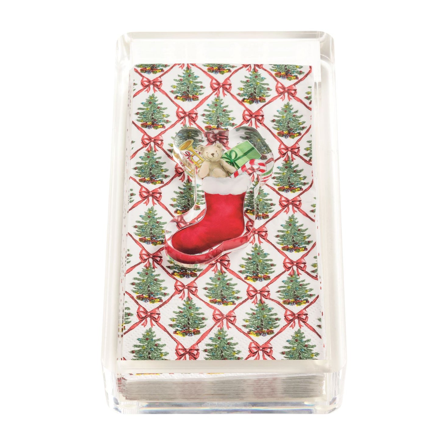 Christmas Paper Guest Towel Caddy and Weight Set, A clear acrylic caddy holding paper guest towels printed with Christmas trees in a red ribbon lattice, topped with a clear acrylic weight shaped like a red stocking full of toys.
