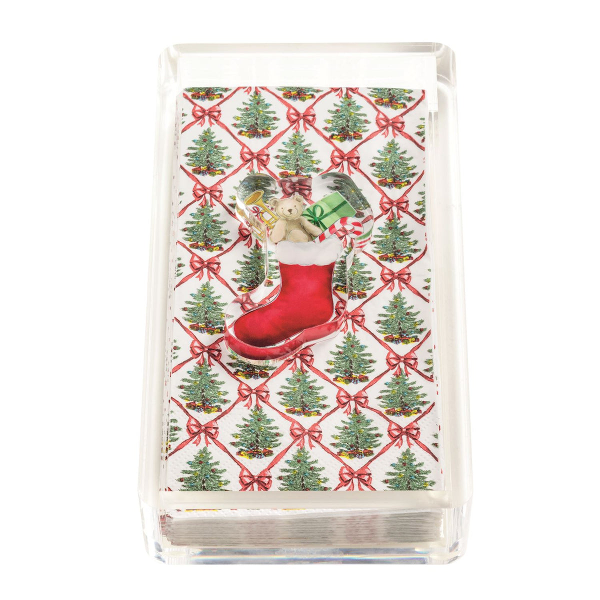 Christmas Paper Guest Towel Caddy and Weight Set, A clear acrylic caddy holding paper guest towels printed with Christmas trees in a red ribbon lattice, topped with a clear acrylic weight shaped like a red stocking full of toys.