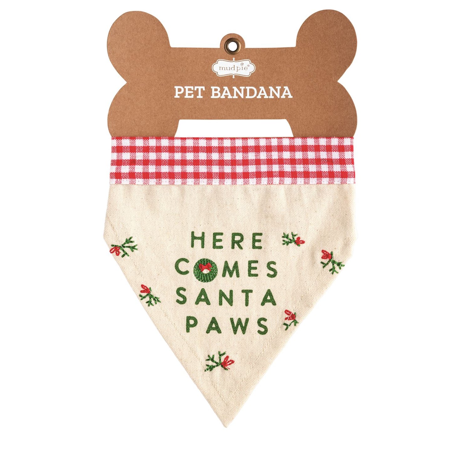 Here Comes Santa Paws Pet Bandana, A natural canvas dog bandana embroidered here comes Santa Paws in green with holly sprigs and a red gingham top band, shown on a bone-shaped kraft hangtag.