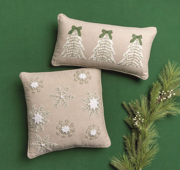 Beaded Snowflake Square Pillow, A square pillow in natural flax colored fabric covered with eight snowflakes worked in silver and white beads.