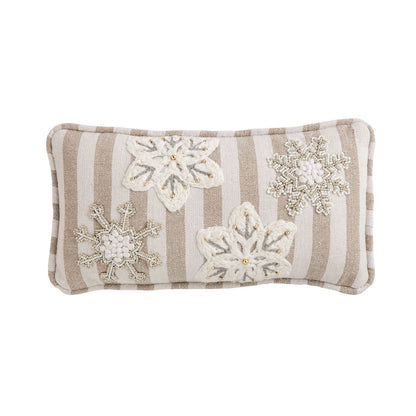 Snowflake Beaded Mini Pillow in Woven Stripe, A small rectangular pillow in a tan and cream woven stripe with four white snowflakes, two worked in beads and two in raised ivory yarn with gold bead centers.