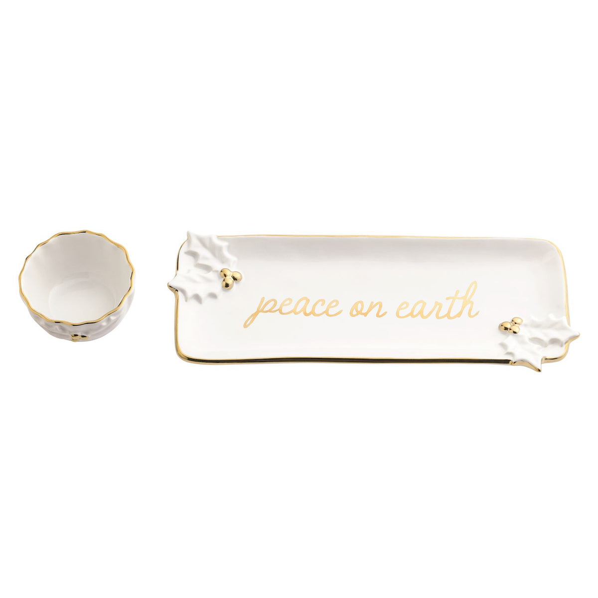 Gold Holly Tray and Tidbit Bowl Set, A long white stoneware tray lettered peace on earth in gold with sculpted holly leaves and gold berries, shown beside a small scalloped bowl with a gold rim.