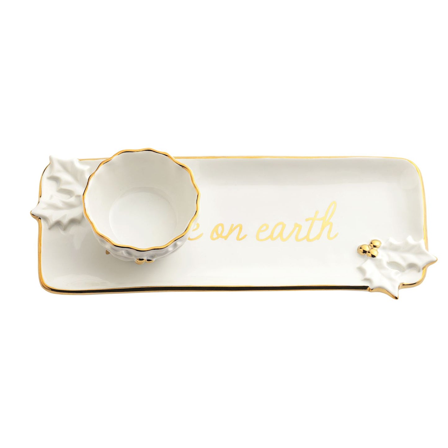 Gold Holly Tray and Tidbit Bowl Set, A long white stoneware tray lettered peace on earth in gold with sculpted holly leaves and gold berries, shown beside a small scalloped bowl with a gold rim.