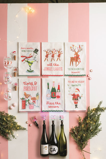 Dear Santa Bring Tequila Glitter Hand Towel, A cream hand towel printed with a snowman rising from a pine-garlanded margarita glass in a red scarf and top hat, above the words dear santa, bring tequila, with a green sequin hem.