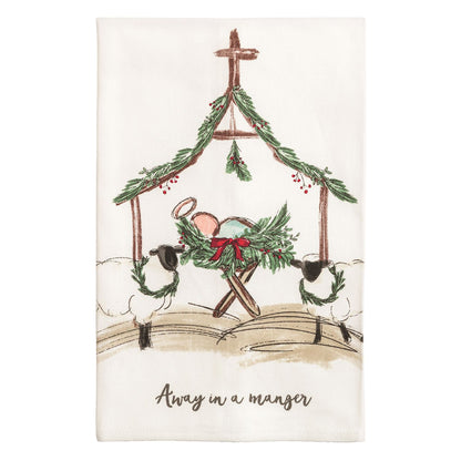 Away in a Manger Nativity Poplin Hand Towel, Cream hand towel printed with a wooden stable draped in pine, the Christ child asleep in a greenery manger with a red bow, two sheep beside it, and Away in a manger written below.