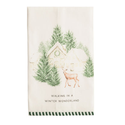 Winter Wonderland House Cotton Hand Towel, A cream cotton towel printed with a snowy house, evergreen trees and a deer above the words Walking In A Winter Wonderland, with a green and white striped hem.