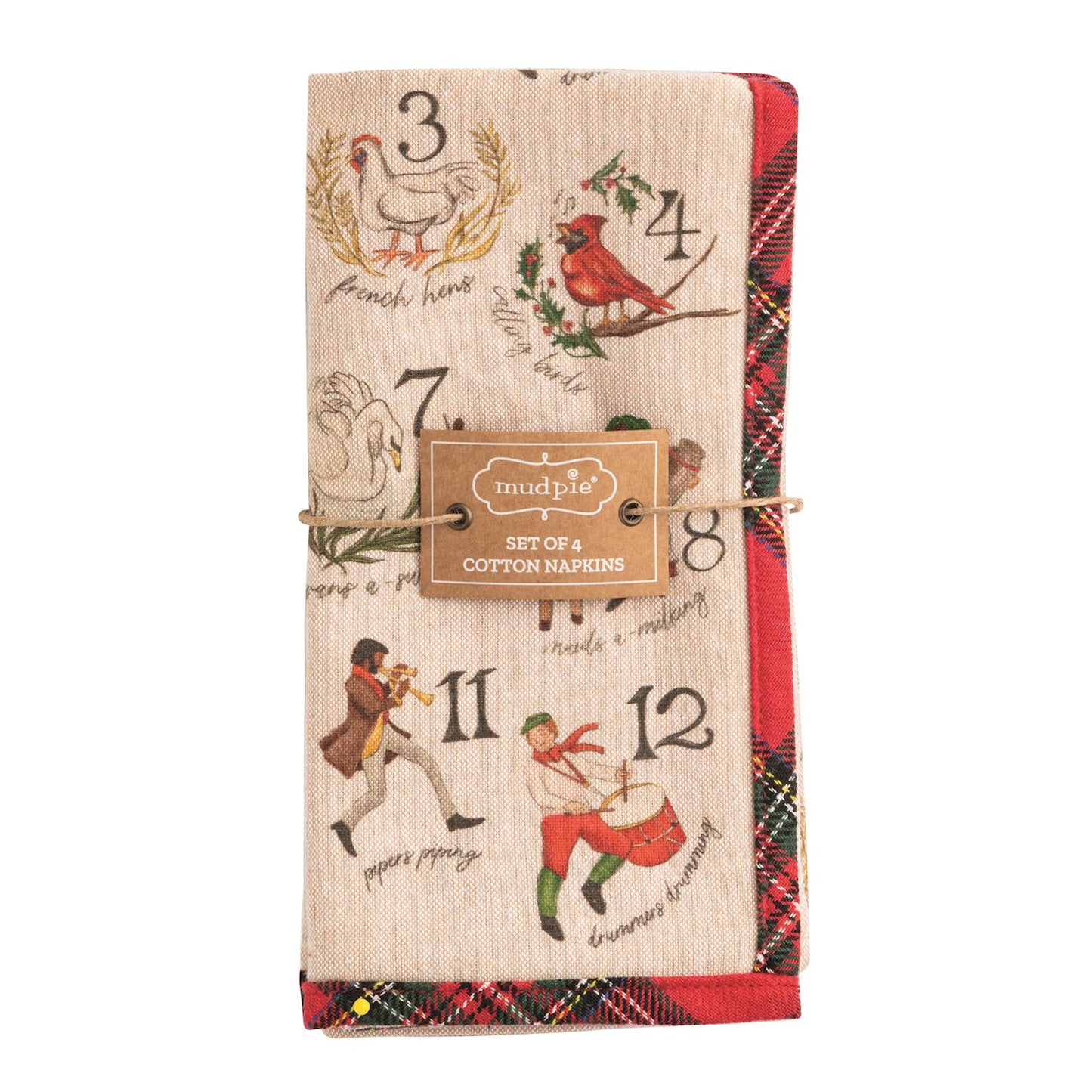 A folded stack of cream cotton napkins printed with 12 Days of Christmas motifs and numbers, bordered in red and green tartan plaid, banded with a Mud Pie tag reading Set of 4 Cotton Napkins.