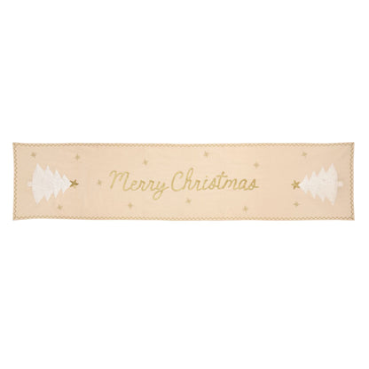 Merry Christmas Snowflake Tree Table Runner, Long pale cream table runner embroidered with Merry Christmas in gold script, a white tree with a gold star at each end, small gold stars scattered between, and a gold zigzag border.