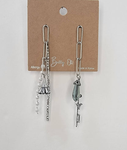 PENDIENTES COLGANTES HECHOS A MANO.