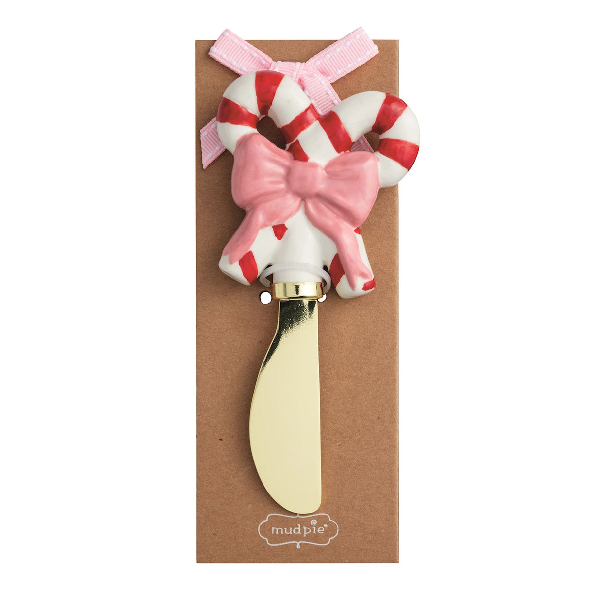 Candy Cane Cheese Spreader with Hand-Painted Handle, A gold toned spreader with a hand-painted candy cane handle striped in red and white and a pink bow, mounted on a kraft card.