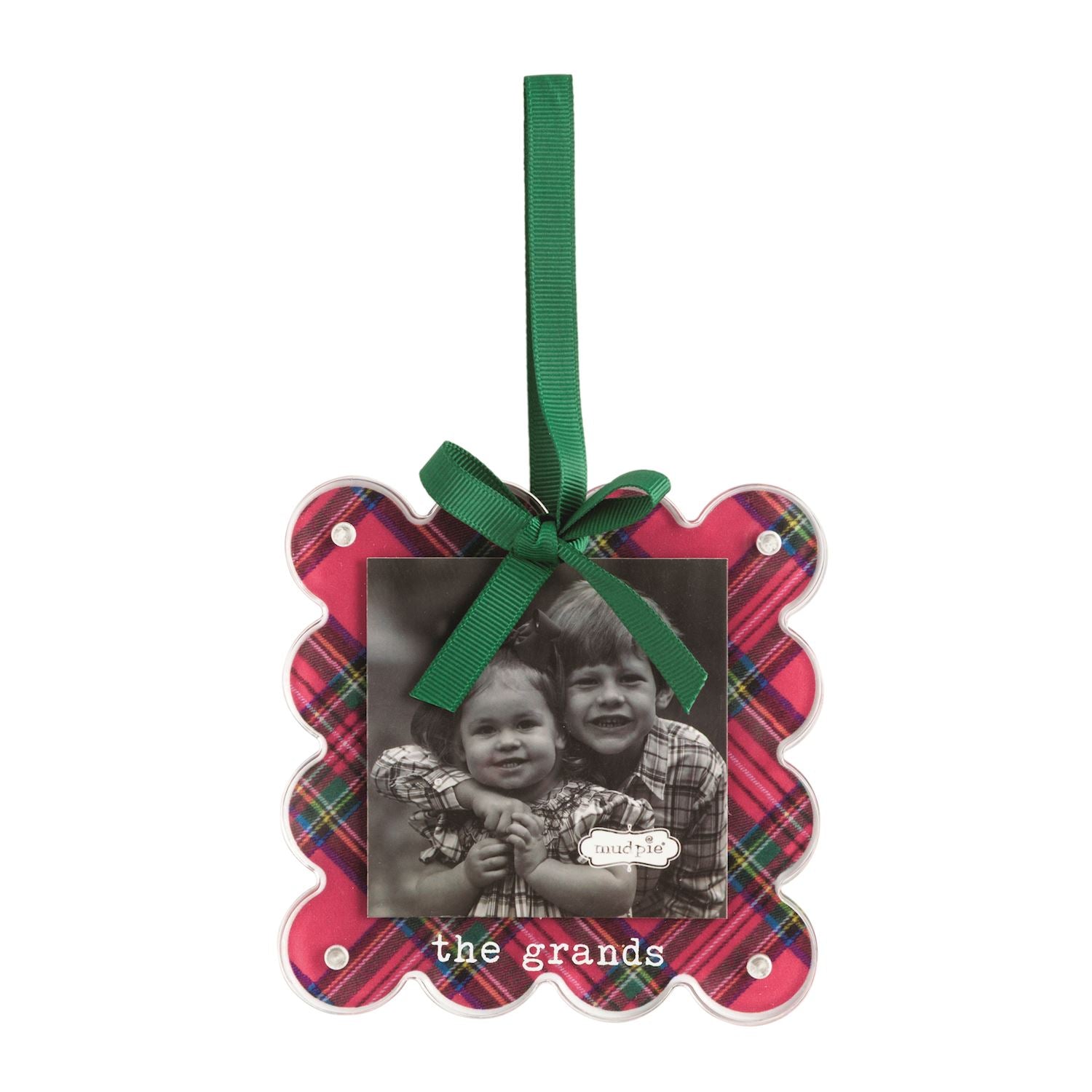 The Grands Tartan Photo Ornament, A scalloped square acrylic ornament printed in red tartan, holding a black and white photo of two children behind a magnetic front, lettered the grands, with a green ribbon bow and loop.