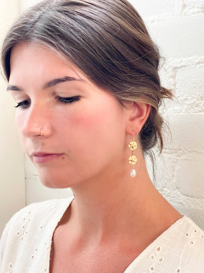 Pearl and two flower dangle earrings