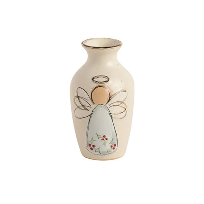 Holly Angel Speckled Stoneware Bud Vase, A small cream speckled stoneware bud vase with a flared dark-edged rim, hand-painted with an angel whose pale gown is scattered with holly leaves and red berries.