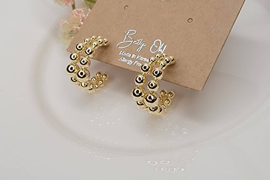 BEADED HOOP EARRINGS.