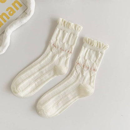Calcetines blancos con borde enrollado para mujer