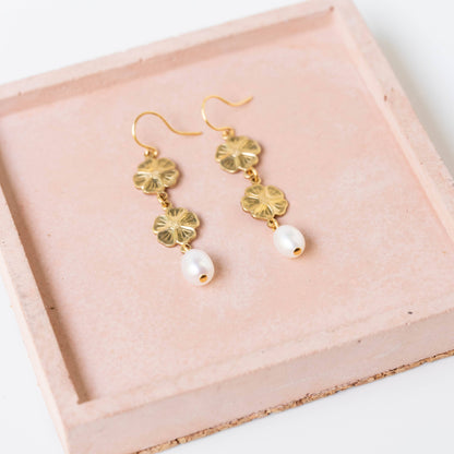 Pearl and two flower dangle earrings