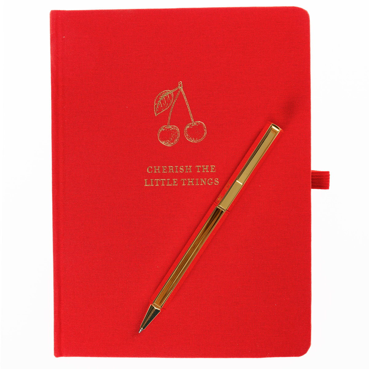 La Petite Presse Cherry Fabric-Bound Journal with Pen, A cherry red fabric journal with gold foil cherries and the words Cherish the Little Things on the cover, paired with a gold twist pen.