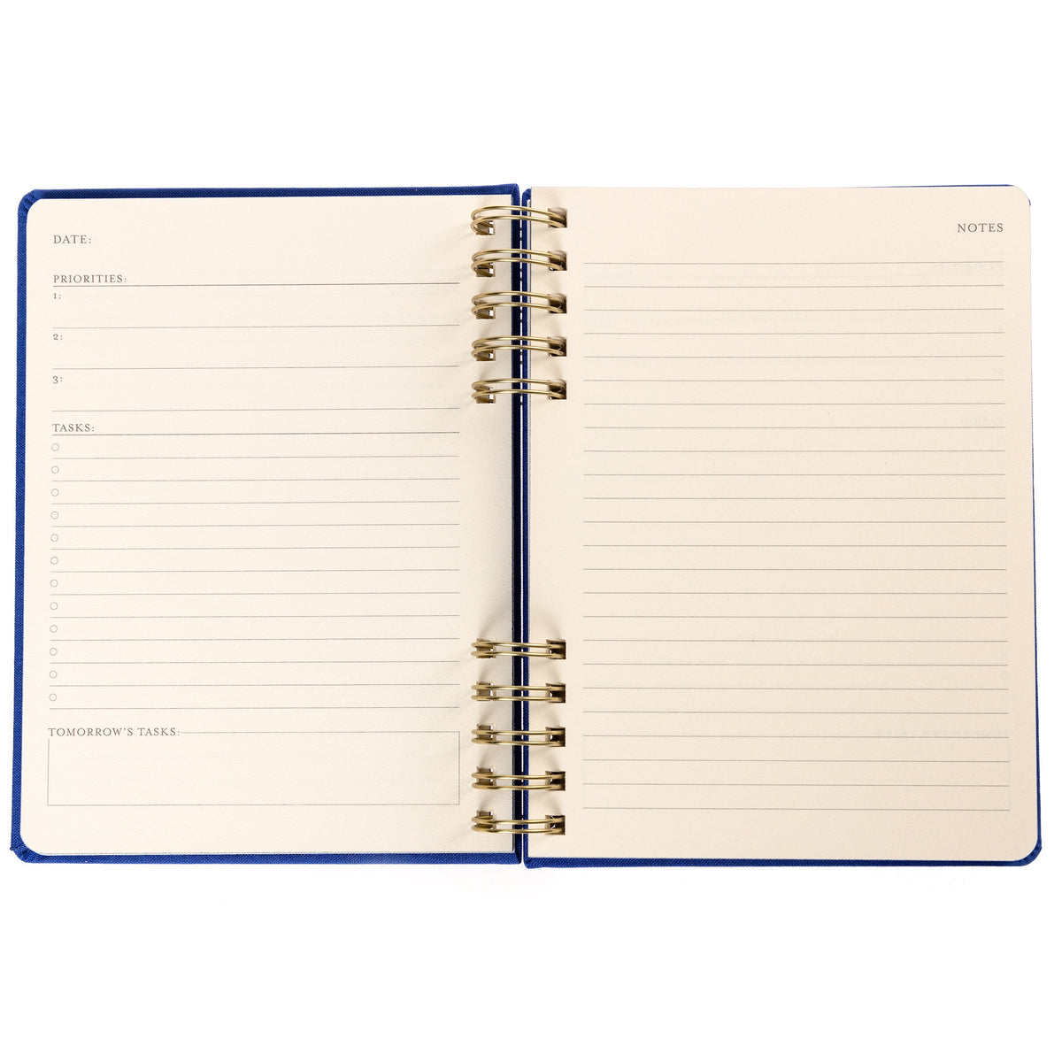 Cobalt Blue Fabric-Bound Task Journal, A cobalt blue fabric-covered task journal with gold twin wire spirals and two navy ribbon bookmark tabs, closed with an elastic band.