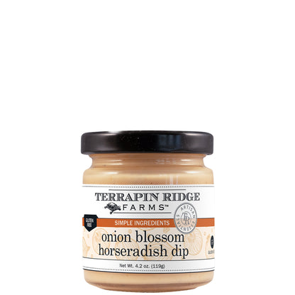 A small glass jar of Terrapin Ridge Farms onion blossom horseradish dip with a black lid and a white label reading net wt. 4.2 oz.