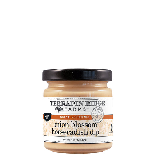 A small glass jar of Terrapin Ridge Farms onion blossom horseradish dip with a black lid and a white label reading net wt. 4.2 oz.