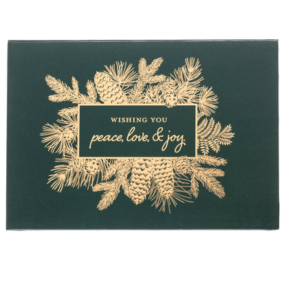 Peace Holiday Keepsake Boxed Cards, A dark green boxed Christmas card set with a gold foil pinecone and pine bough design reading Wishing you peace, love, and joy.