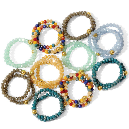 Iris espléndido - Juego de 24 anillos de cristal elásticos