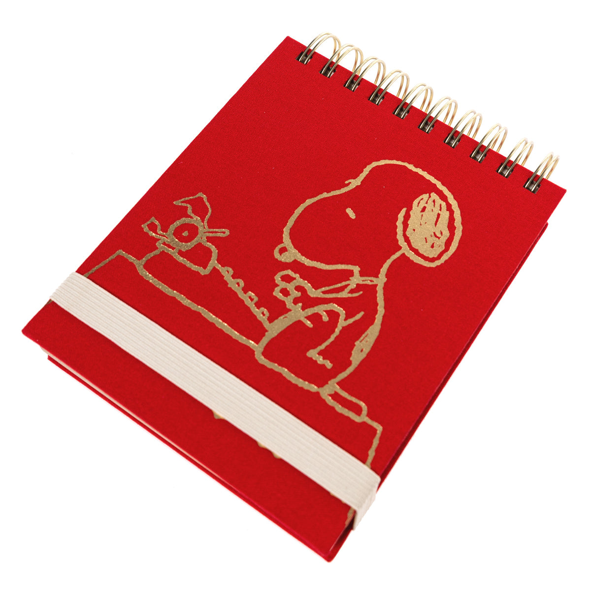 Peanuts Fabric-Bound Notepad, A red fabric-bound notepad with Snoopy typing at his typewriter in gold foil on the cover and gold gilded page edges.