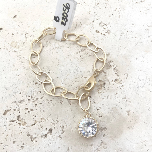 Matte gold bracelet with crystal charm