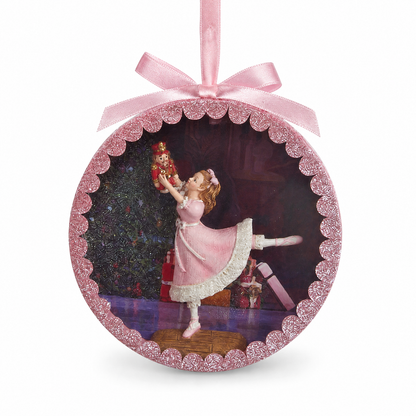 Nutcracker Suite Shadow Box Ornament, Clara Dancing design: Clara in a pink dress, one leg lifted, holding her nutcracker high