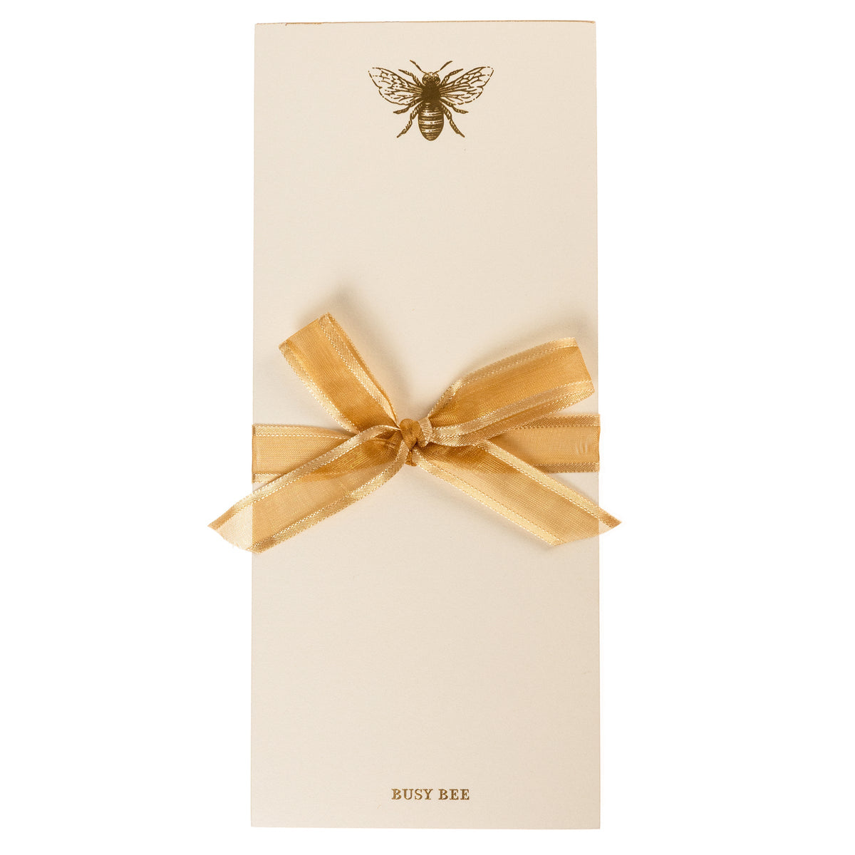 La Petite Presse Bee Gilded Desktop Notepad, A cream notepad with a gold foil bee at the top and the words Busy Bee stamped in gold at the bottom, with a gold gilded edge.