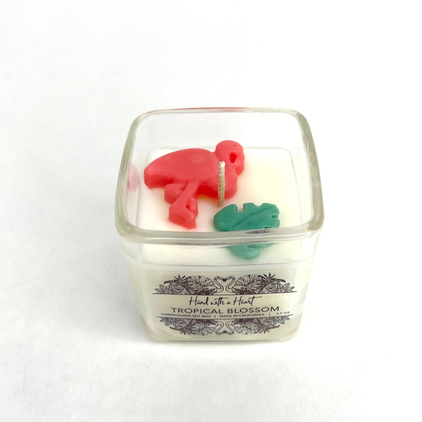 Vela de cera de soja con flores tropicales
