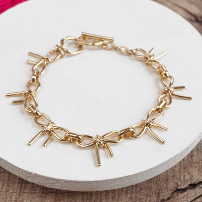 PennyLine inc - Bow Link Bracelet Gold Tone