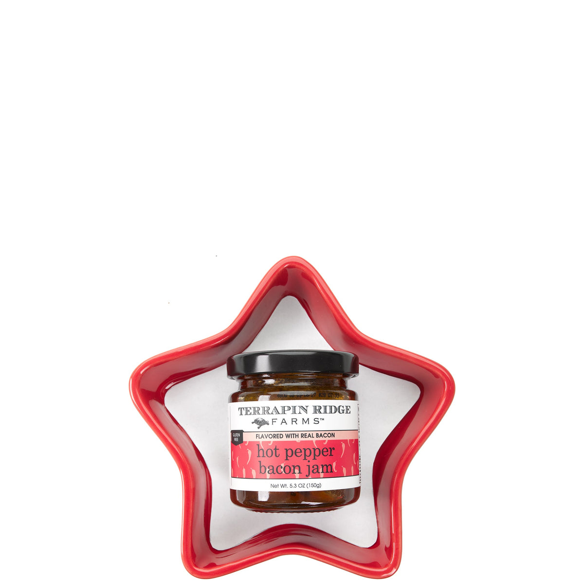 A red ceramic star-shaped dish holding a small jar of Terrapin Ridge Farms hot pepper bacon jam, net wt. 5.3 oz.