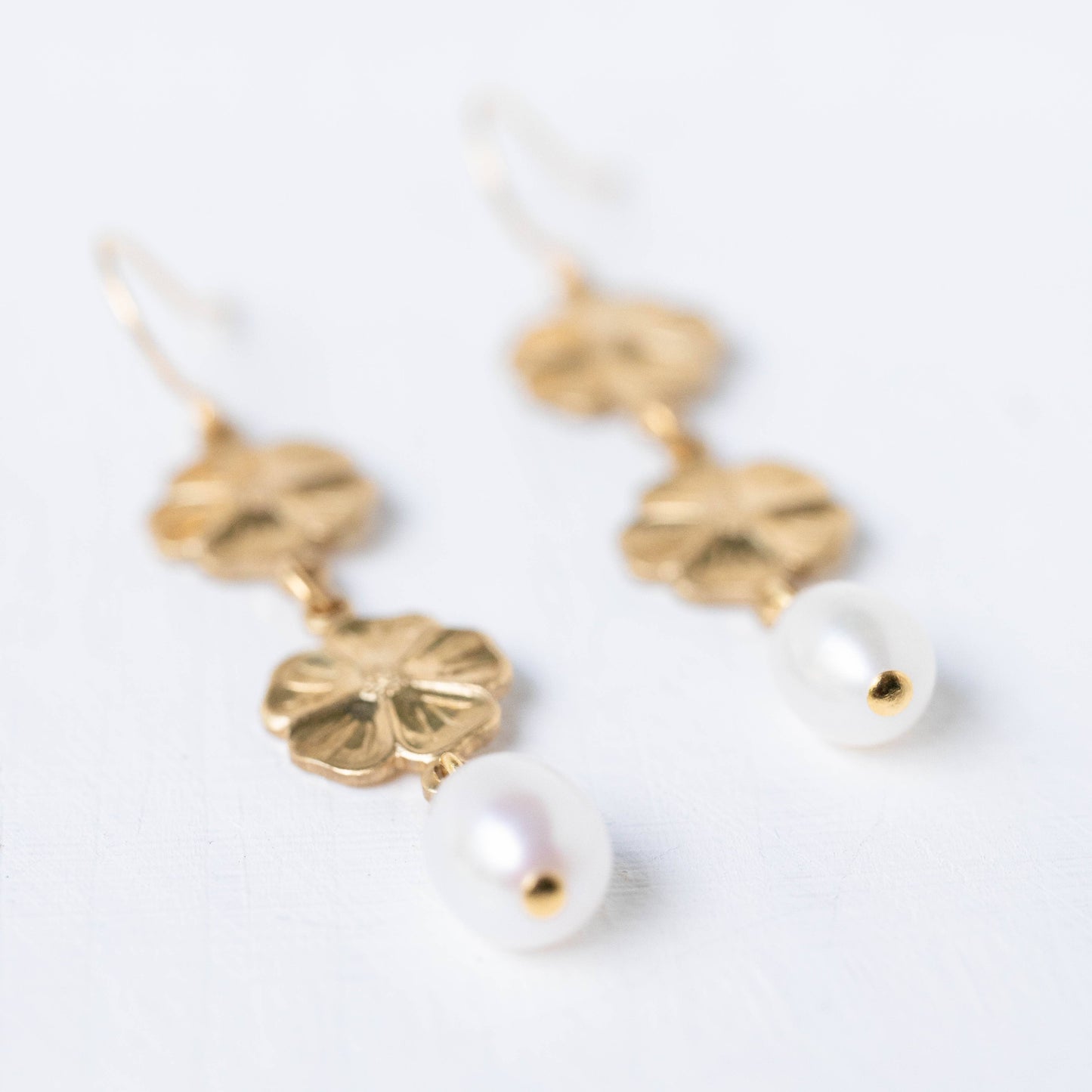 Pearl and two flower dangle earrings