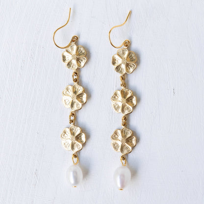 Pearl and three flowers dangle earrings