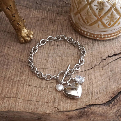 PennyLine inc - Heartstring Glow – Toggle Charm Bracelet with Pearl & Crystal