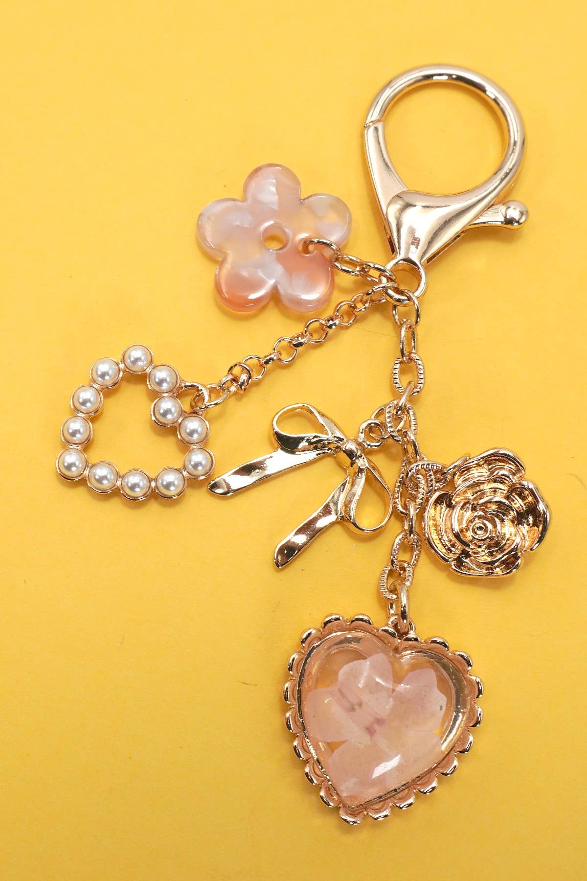 JOSSLYN by wall to wall - BAG CHARM- PRESSED FLOWER BOW PEARL HEART CHARMS | 80K026