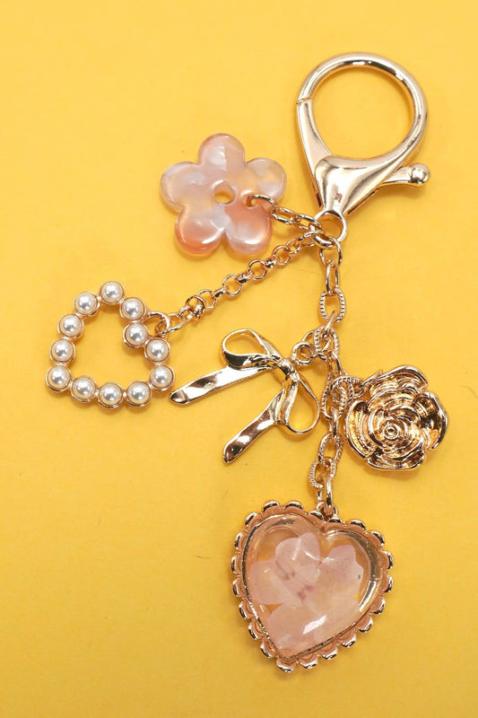 JOSSLYN by wall to wall - BAG CHARM- PRESSED FLOWER BOW PEARL HEART CHARMS | 80K026