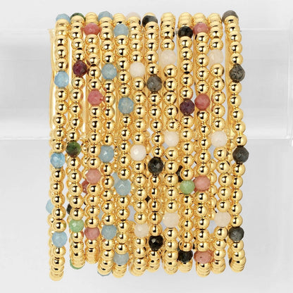 Espléndido Iris - Juego de 12 pulseras elásticas con cuentas y detalles de piedra.