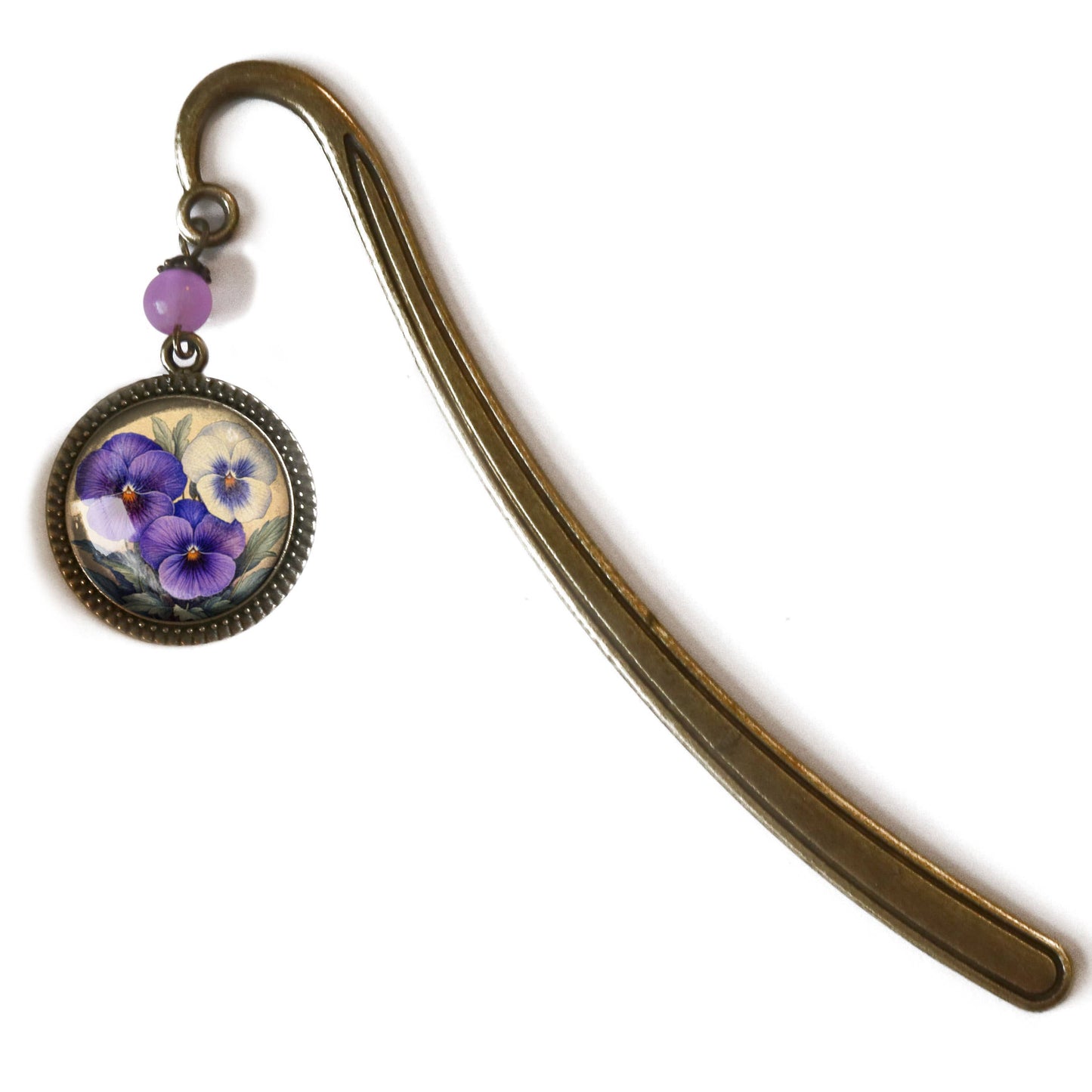Marcapáginas de bronce con flores primaverales de pensamientos morados