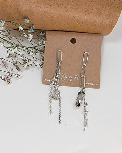 PENDIENTES COLGANTES HECHOS A MANO.