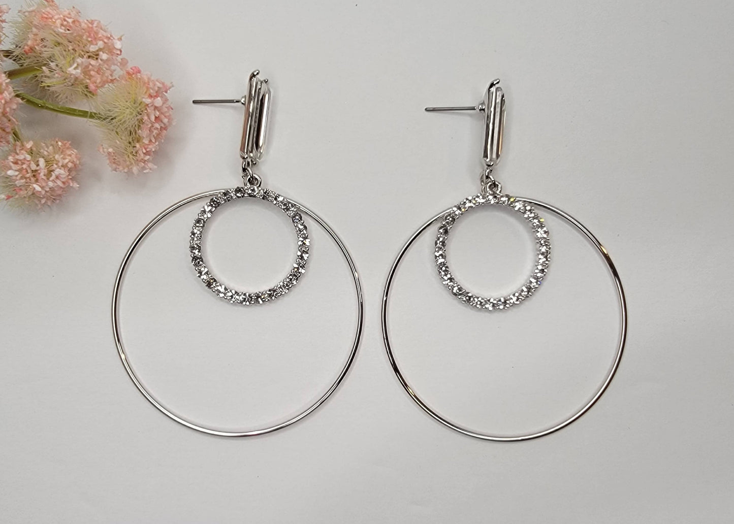 DOUBLE ROUND DANGLE EARRINGS.