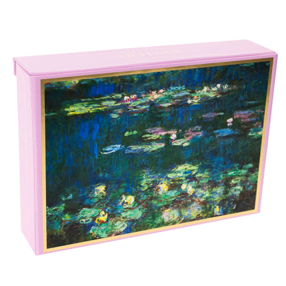 Monet Water Lilies Keepsake Boxed Cards, A pink box with a gold foil bordered reproduction of Monet's Water Lilies painting on the lid, opened to show blank cards and envelopes inside.