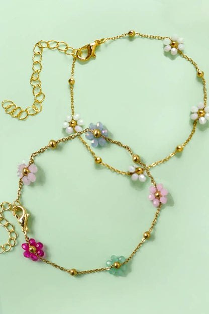 JOSSLYN de wall to wall - PULSERAS DE VERANO CON DIJE DE FLORES Y CUENTAS MÚLTIPLES | 40B108