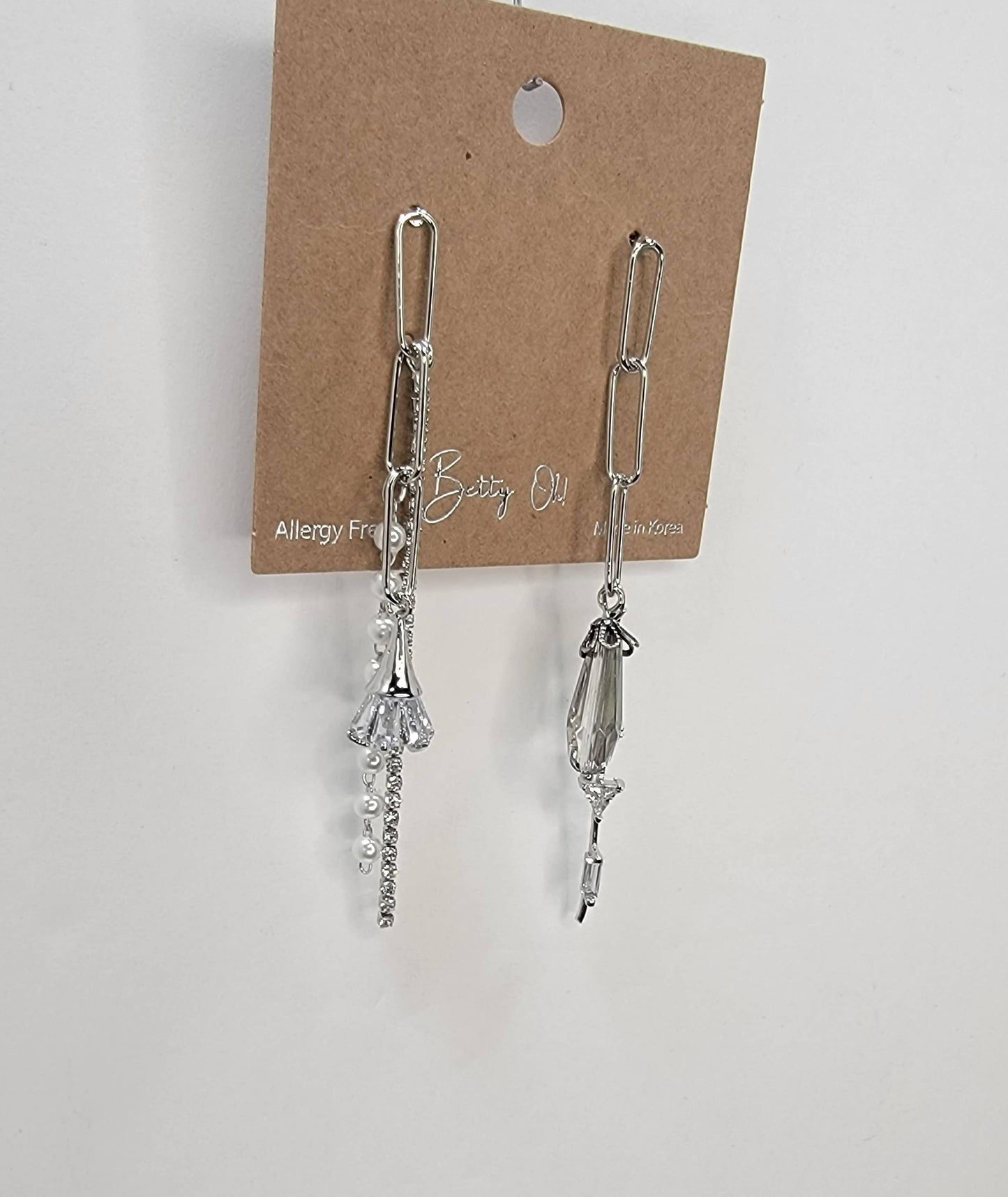 PENDIENTES COLGANTES HECHOS A MANO.