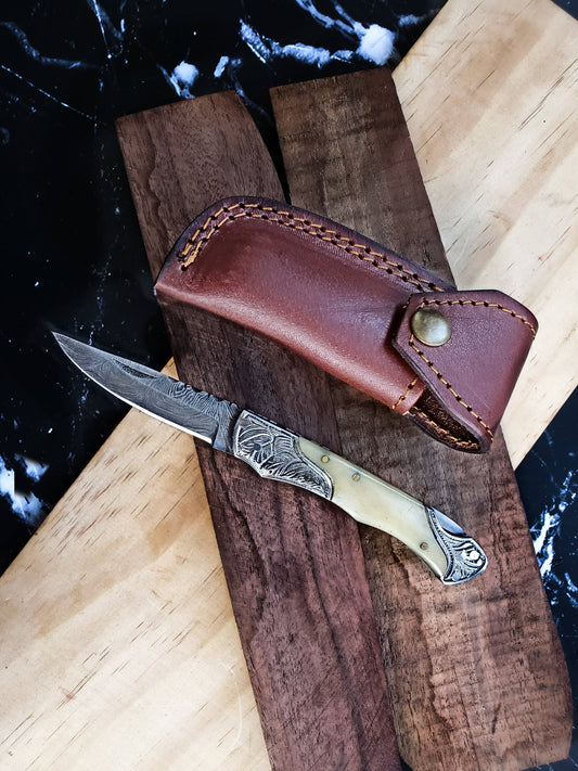 Bone and steel knife with sheath